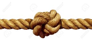 44492734-Rope-knot-isolated-on-a-white-background-as-a-strong-nautical-marine-line-tied-together-as-a-symbol--Stock-Photo